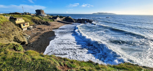 Sea Laps Sandy Beach ...